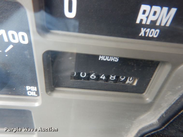 image for item IV9503 2001 International 4700  flatbed truck with mud mixer