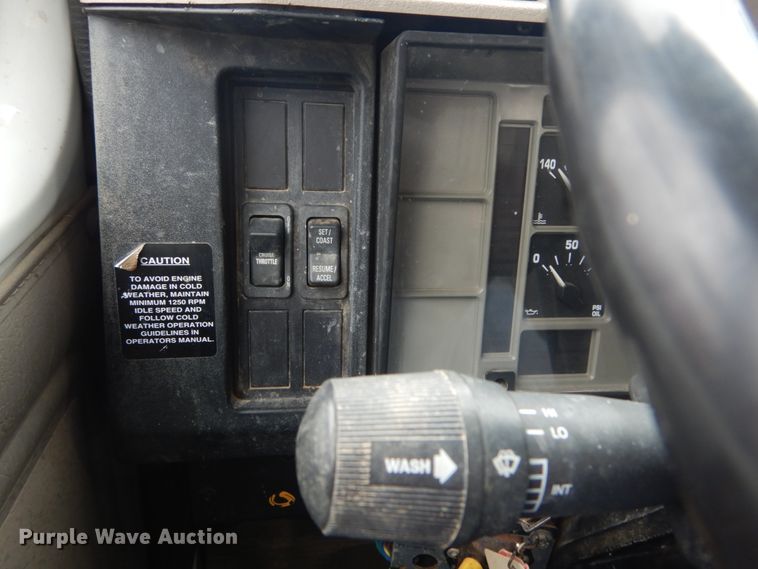 image for item IV9503 2001 International 4700  flatbed truck with mud mixer