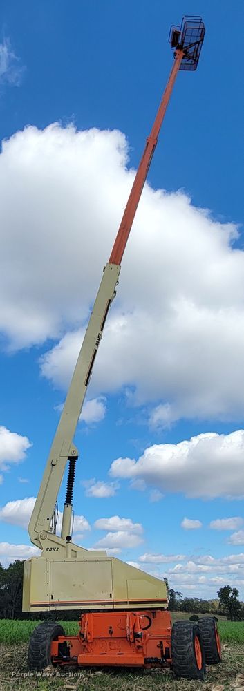 image for item KQ9100 1998 JLG 80HX  boom lift