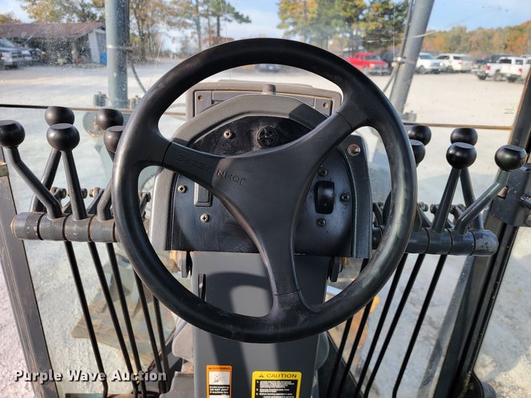 image for item KQ9079 2006 John Deere 770D  motor grader