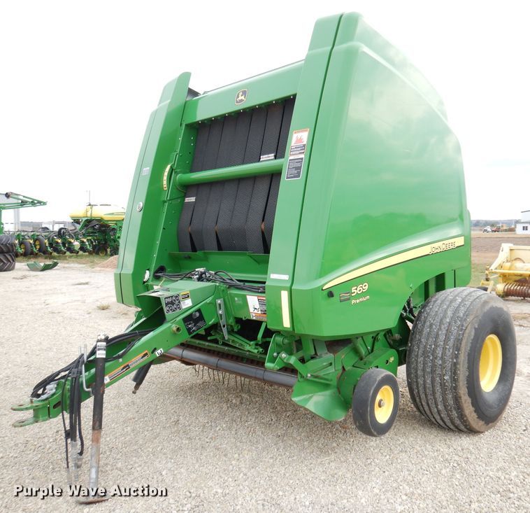 image for item KA9721 2015 John Deere 569 Premium  round baler
