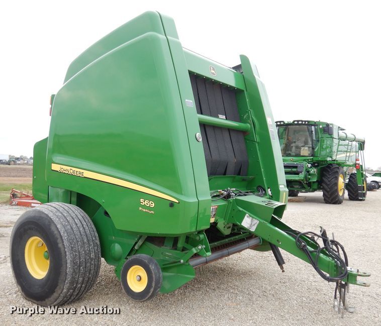 image for item KA9721 2015 John Deere 569 Premium  round baler