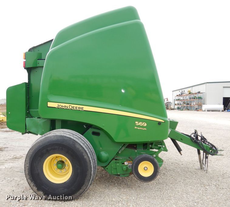 image for item KA9721 2015 John Deere 569 Premium  round baler