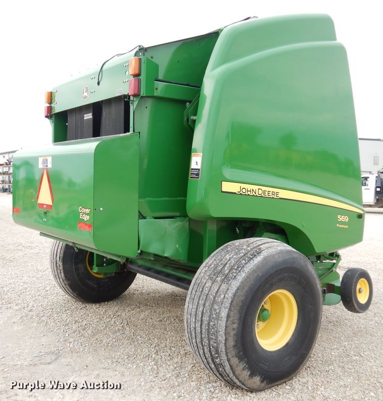 image for item KA9721 2015 John Deere 569 Premium  round baler