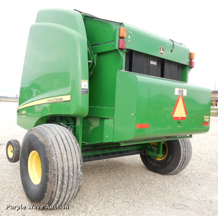 image for item KA9721 2015 John Deere 569 Premium  round baler