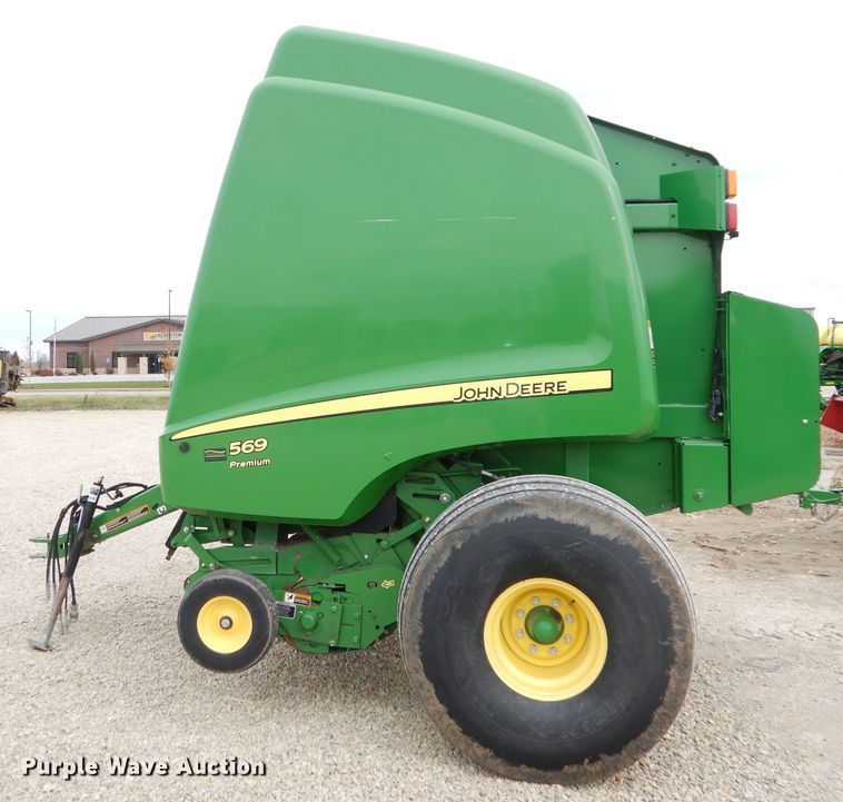 image for item KA9721 2015 John Deere 569 Premium  round baler