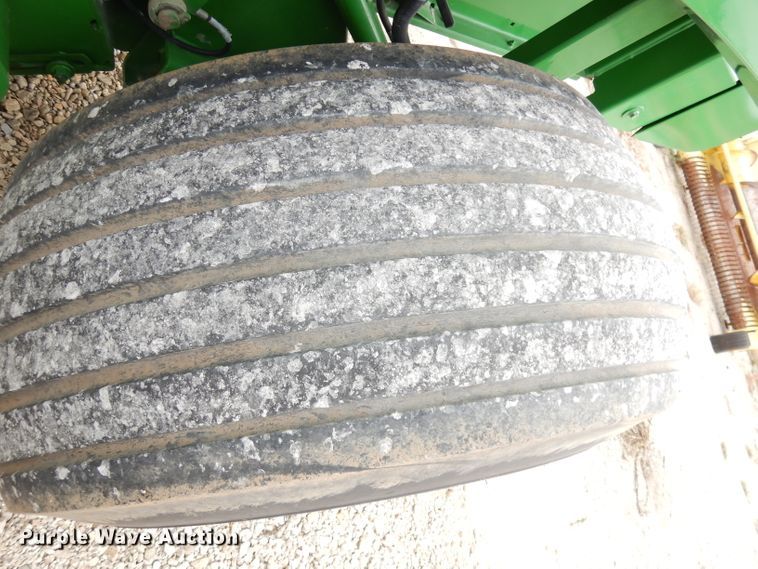 image for item KA9721 2015 John Deere 569 Premium  round baler