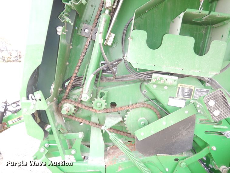 image for item KA9721 2015 John Deere 569 Premium  round baler