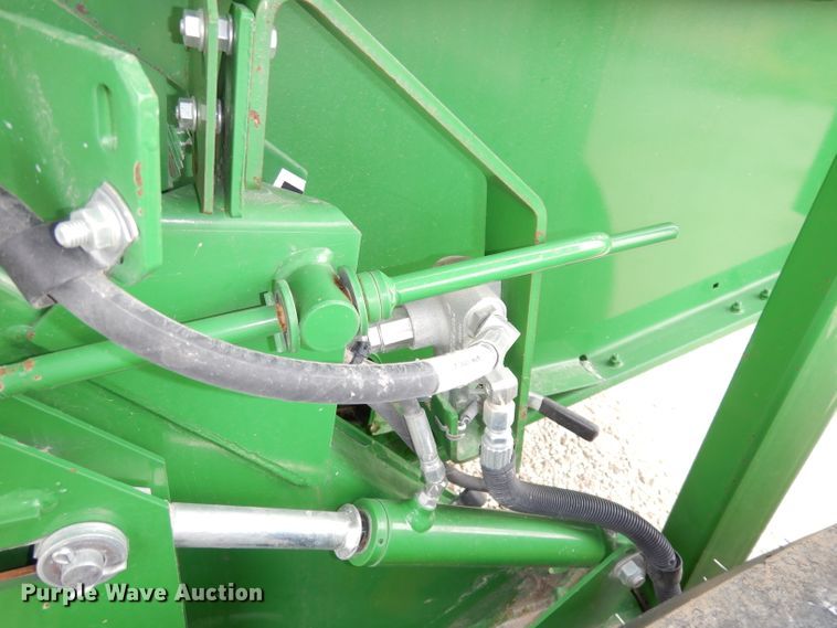 image for item KA9721 2015 John Deere 569 Premium  round baler