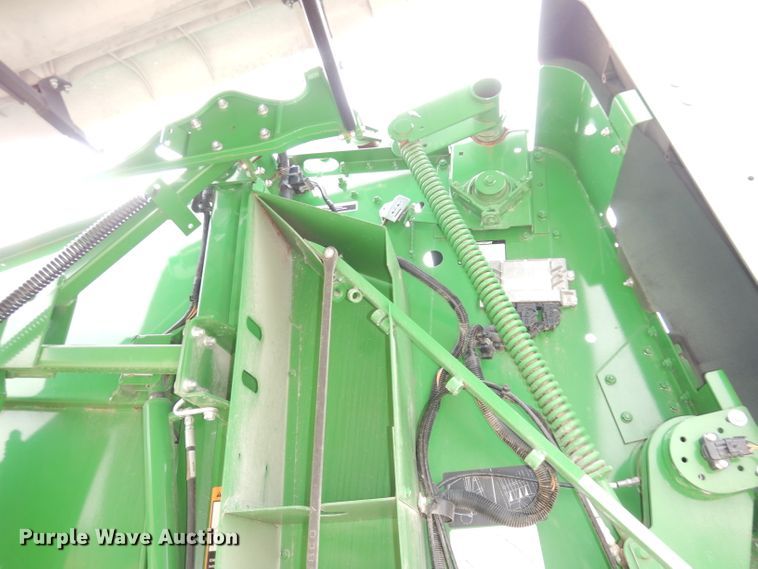 image for item KA9721 2015 John Deere 569 Premium  round baler