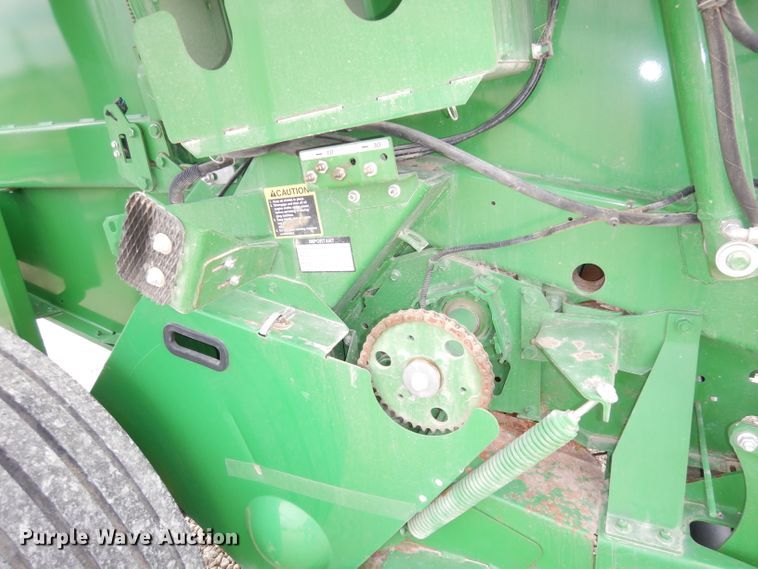 image for item KA9721 2015 John Deere 569 Premium  round baler
