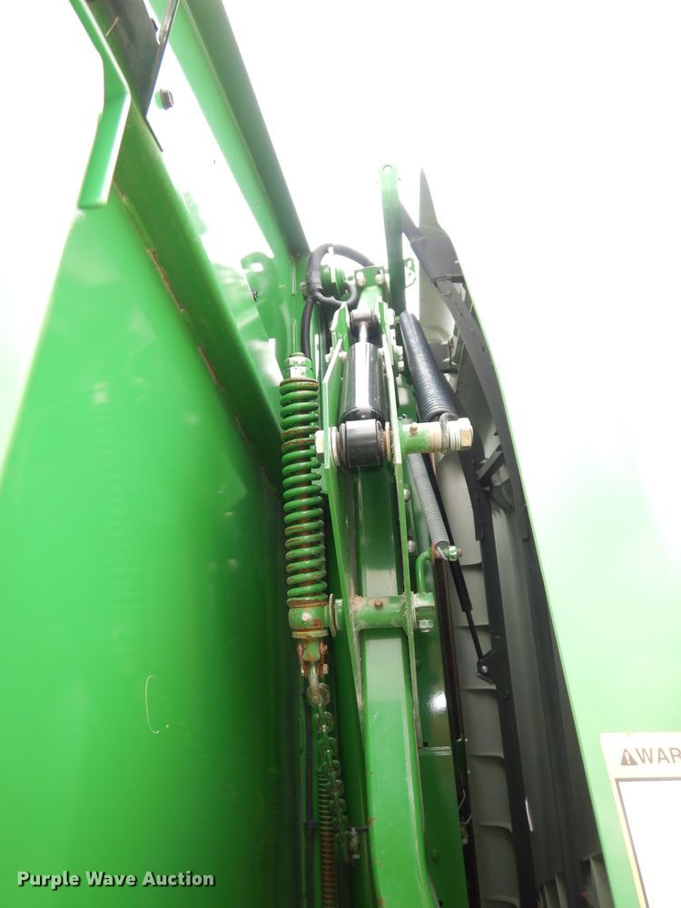 image for item KA9721 2015 John Deere 569 Premium  round baler