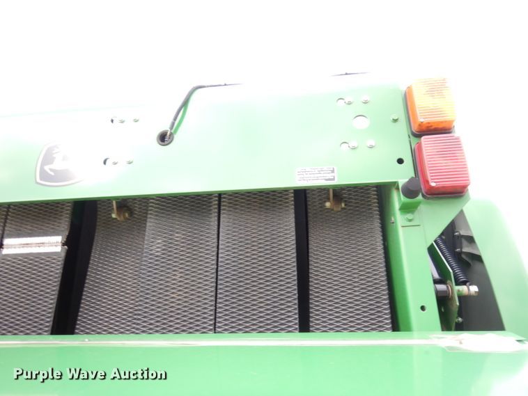 image for item KA9721 2015 John Deere 569 Premium  round baler