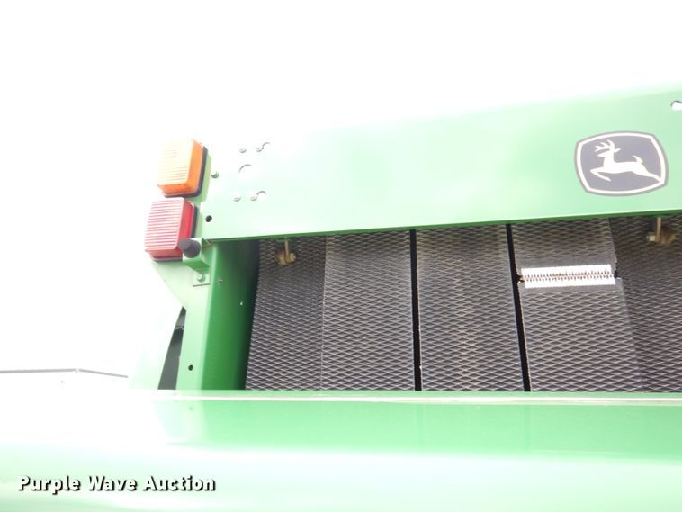image for item KA9721 2015 John Deere 569 Premium  round baler