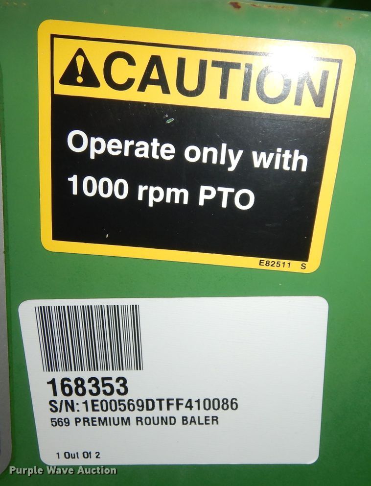 image for item KA9721 2015 John Deere 569 Premium  round baler