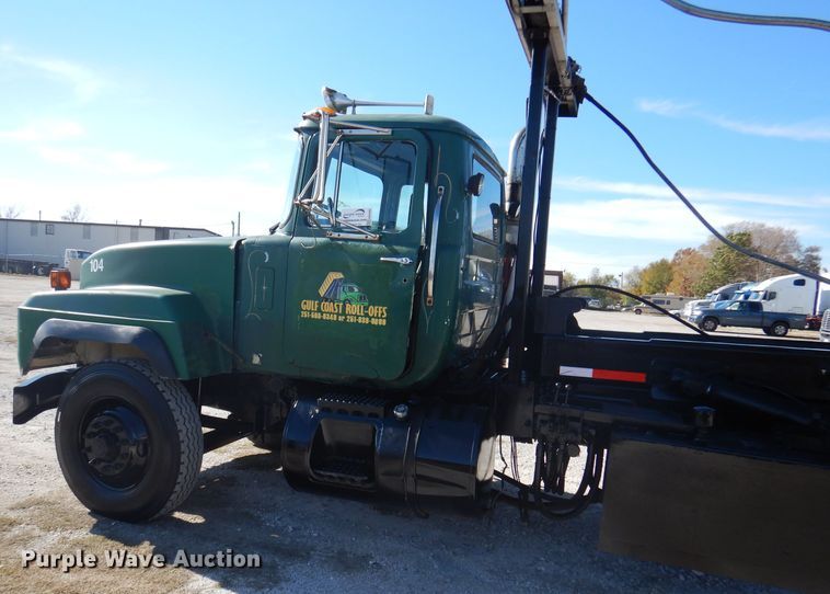 image for item DA5499 1999 Mack RD688S  roll-off container truck