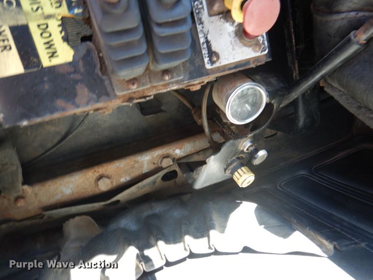 image for item DA5499 1999 Mack RD688S  roll-off container truck