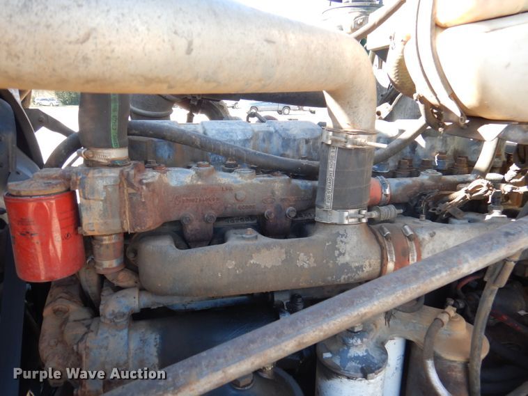 image for item DA5499 1999 Mack RD688S  roll-off container truck