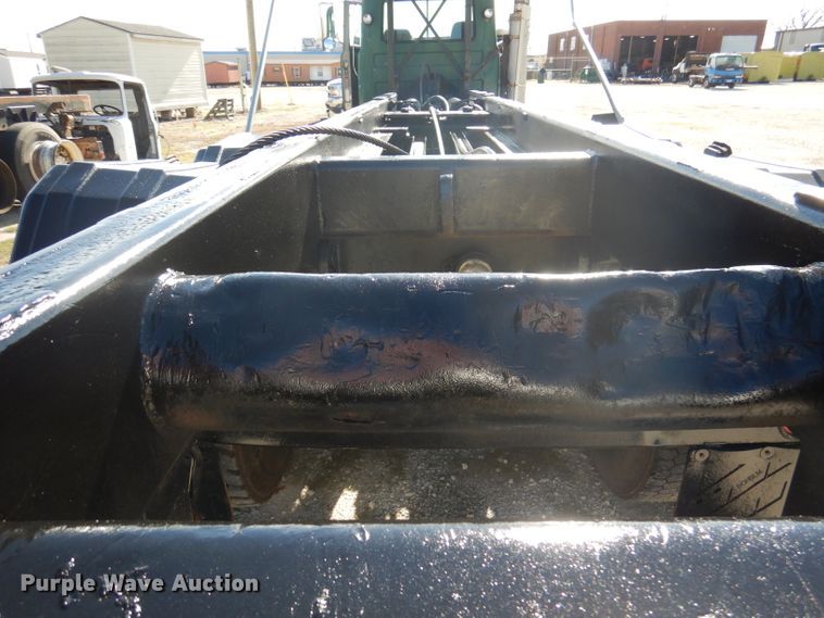 image for item DA5499 1999 Mack RD688S  roll-off container truck