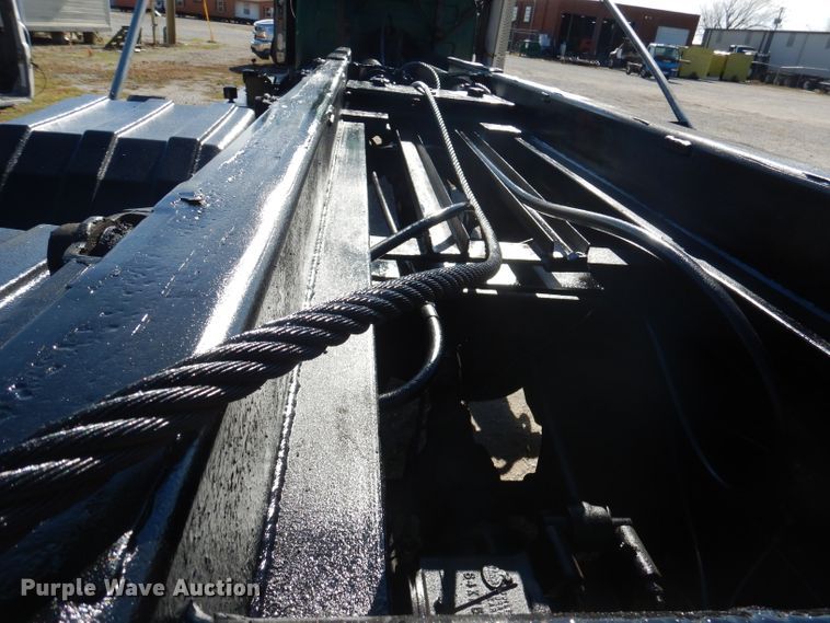 image for item DA5499 1999 Mack RD688S  roll-off container truck