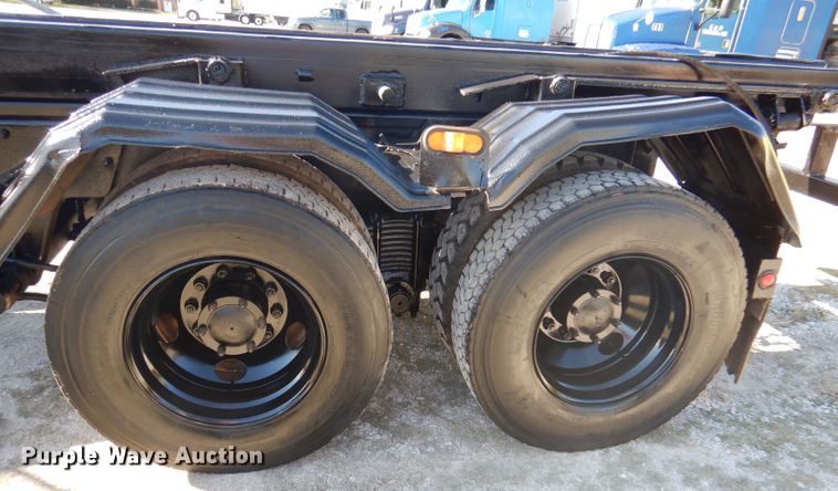 image for item DA5499 1999 Mack RD688S  roll-off container truck