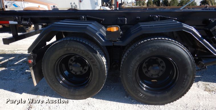 image for item DA5499 1999 Mack RD688S  roll-off container truck