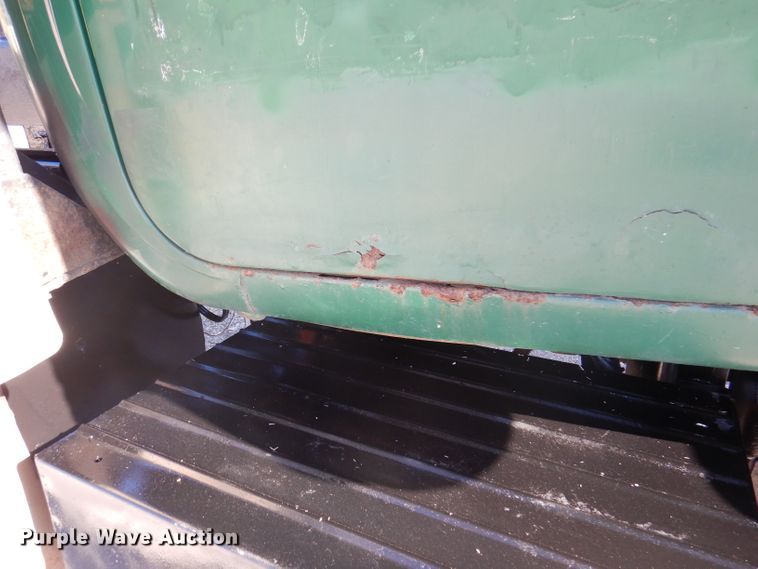 image for item DA5499 1999 Mack RD688S  roll-off container truck