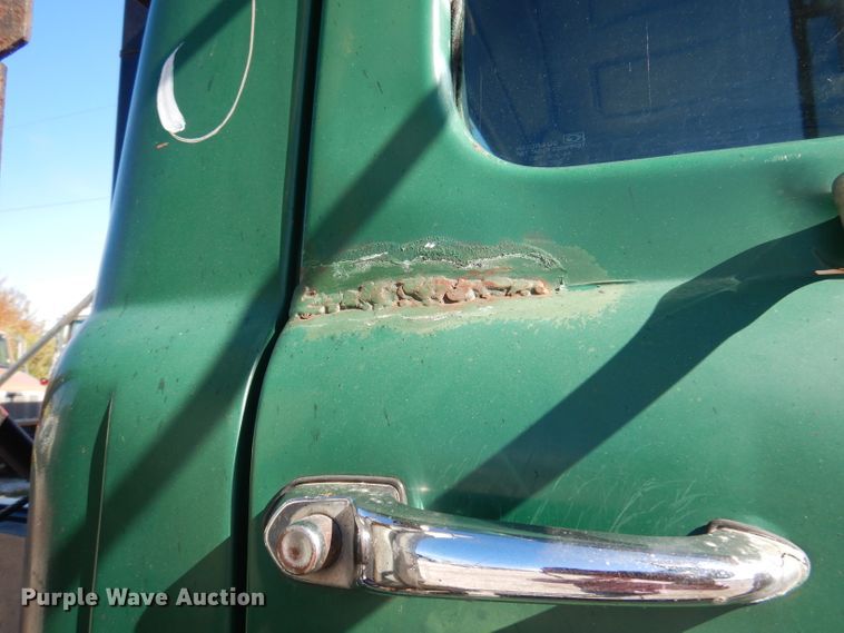 image for item DA5499 1999 Mack RD688S  roll-off container truck