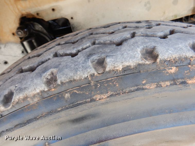 image for item DA5499 1999 Mack RD688S  roll-off container truck