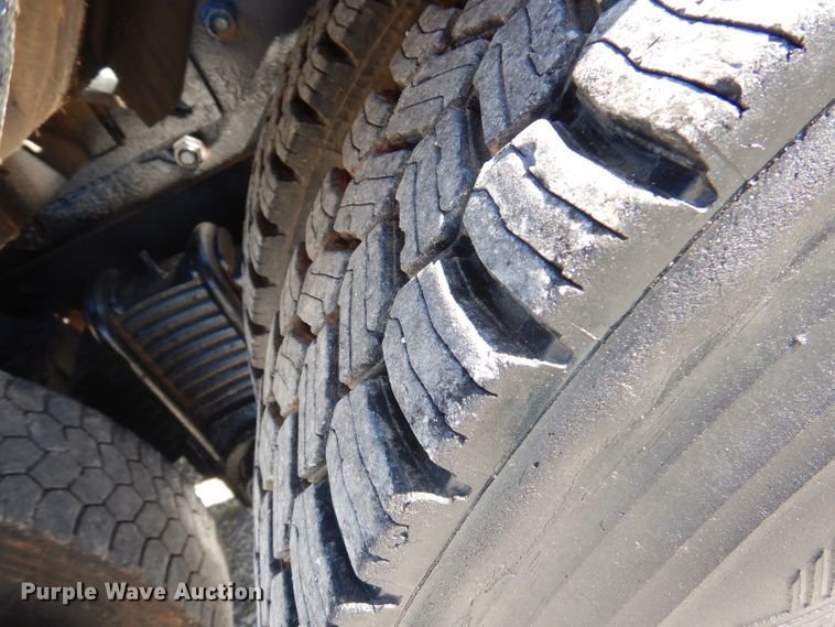 image for item DA5499 1999 Mack RD688S  roll-off container truck