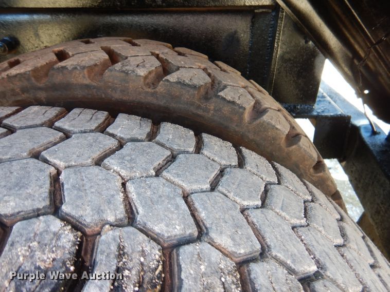 image for item DA5499 1999 Mack RD688S  roll-off container truck