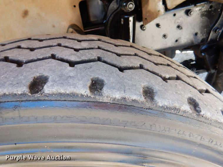 image for item DA5499 1999 Mack RD688S  roll-off container truck