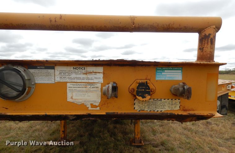 image for item DJ7479 2000 Fontaine FLT-7-35HBTW  drop deck equipment trailer