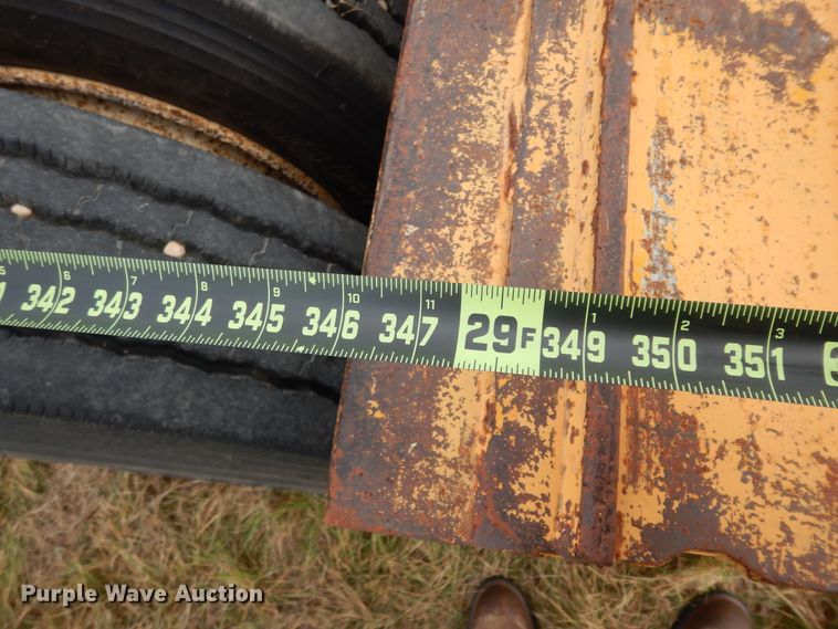 image for item DJ7479 2000 Fontaine FLT-7-35HBTW  drop deck equipment trailer