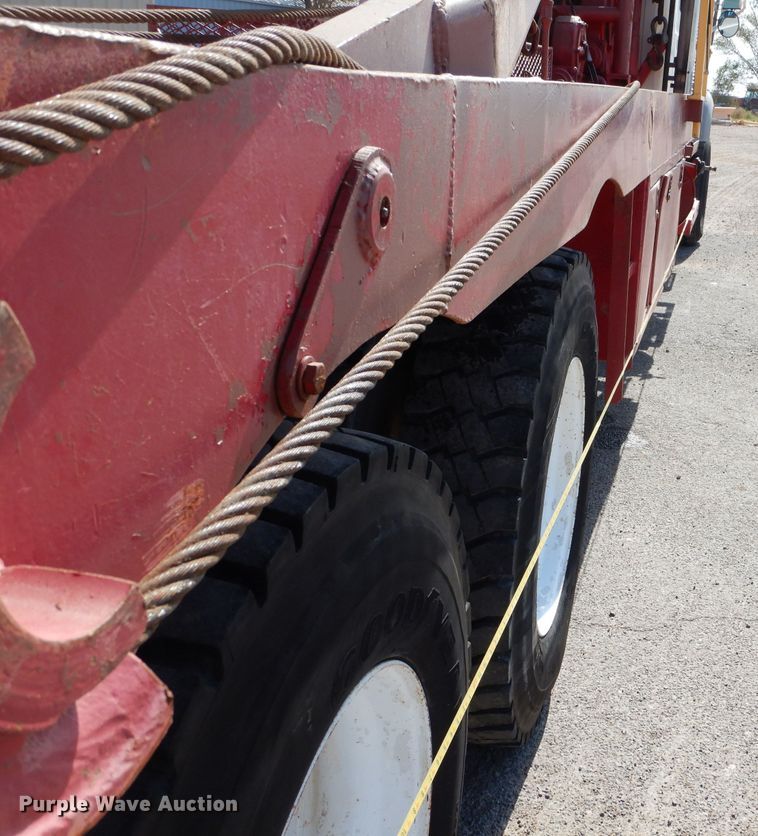 image for item DJ8887 2010 Mack GU713  winch truck