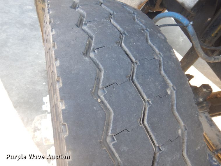 image for item DM5306 2002 Freightliner FL112  roll-off container truck