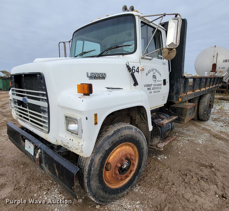 image for item ID9534 1991 Ford LN8000  dump flatbed truck