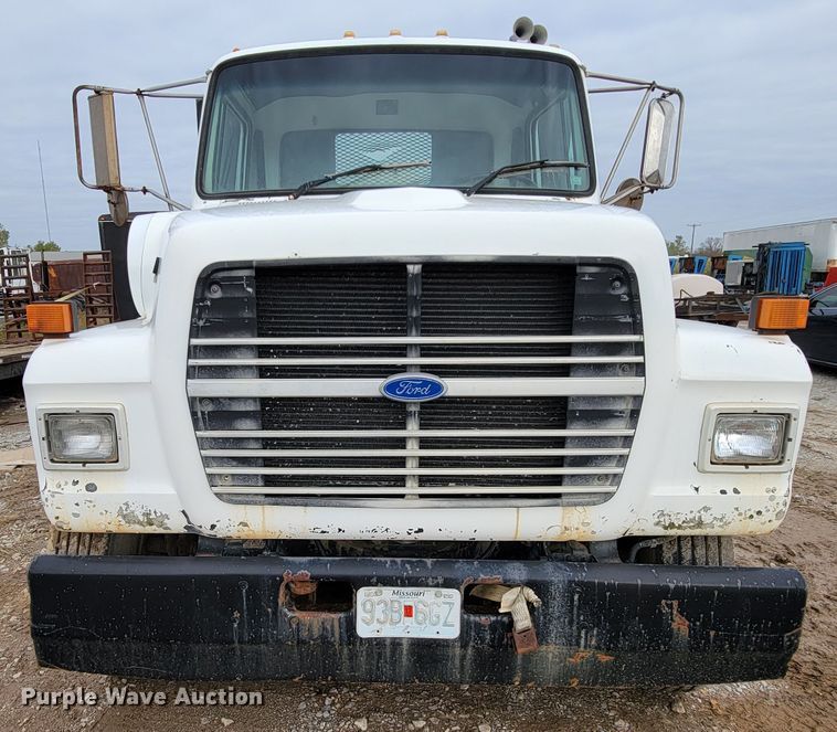 image for item ID9534 1991 Ford LN8000  dump flatbed truck