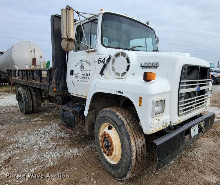 image for item ID9534 1991 Ford LN8000  dump flatbed truck