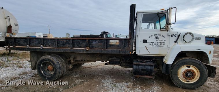 image for item ID9534 1991 Ford LN8000  dump flatbed truck