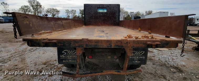 image for item ID9534 1991 Ford LN8000  dump flatbed truck