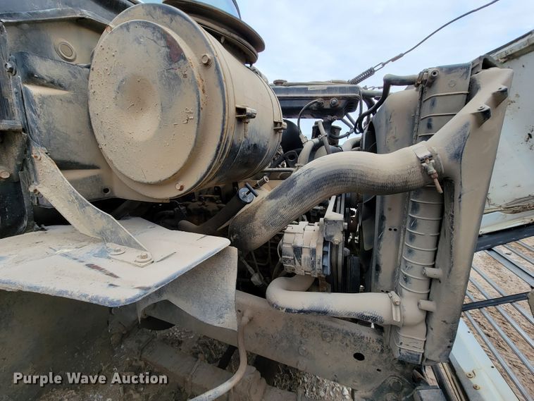 image for item ID9534 1991 Ford LN8000  dump flatbed truck