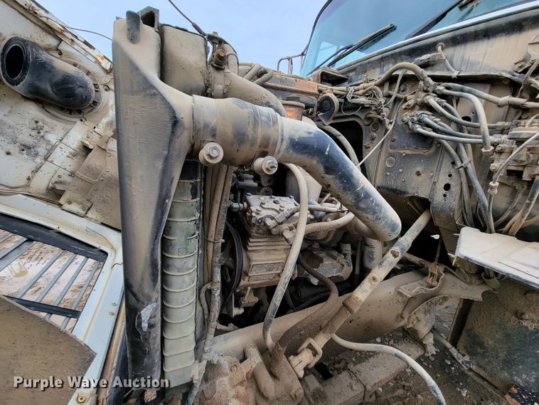 image for item ID9534 1991 Ford LN8000  dump flatbed truck