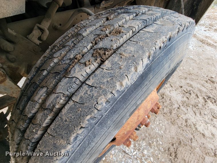 image for item ID9534 1991 Ford LN8000  dump flatbed truck