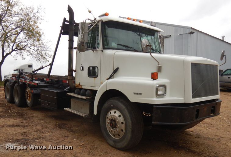 image for item JS9538 1999 Volvo WG  roll-off container truck