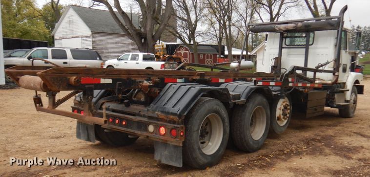 image for item JS9538 1999 Volvo WG  roll-off container truck