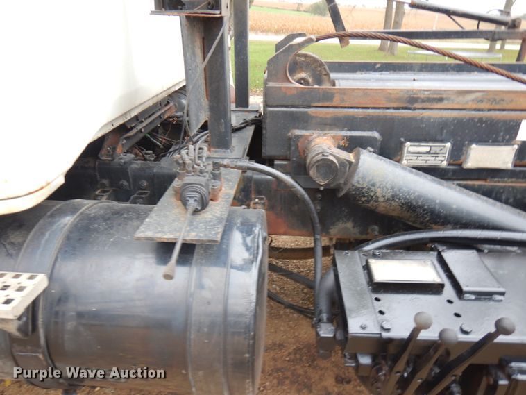 image for item JS9538 1999 Volvo WG  roll-off container truck