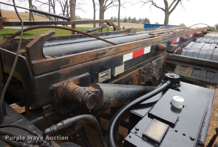 image for item JS9538 1999 Volvo WG  roll-off container truck