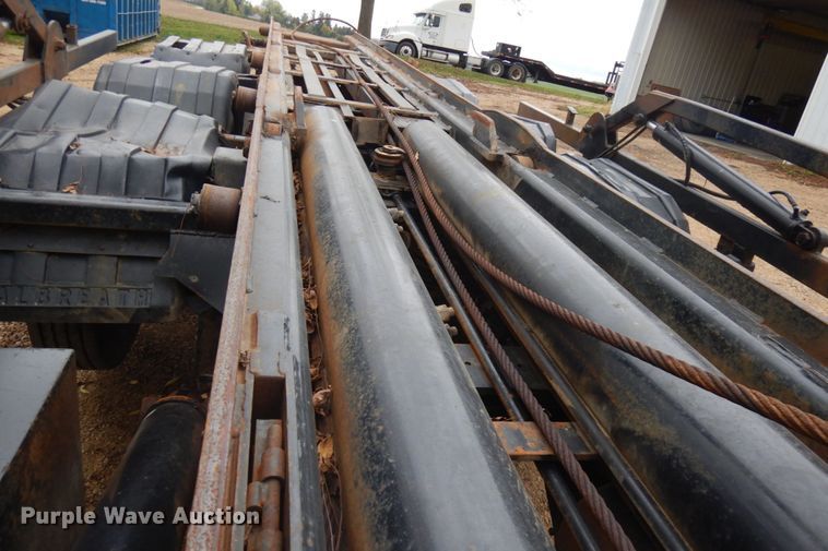 image for item JS9538 1999 Volvo WG  roll-off container truck