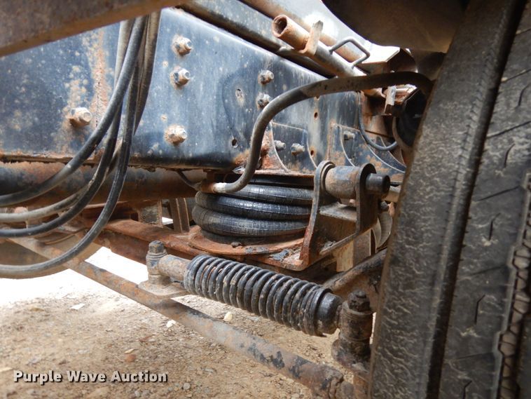 image for item JS9538 1999 Volvo WG  roll-off container truck